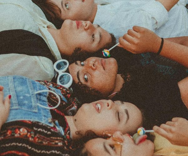 Diverse group of people smiling and looking healthy.